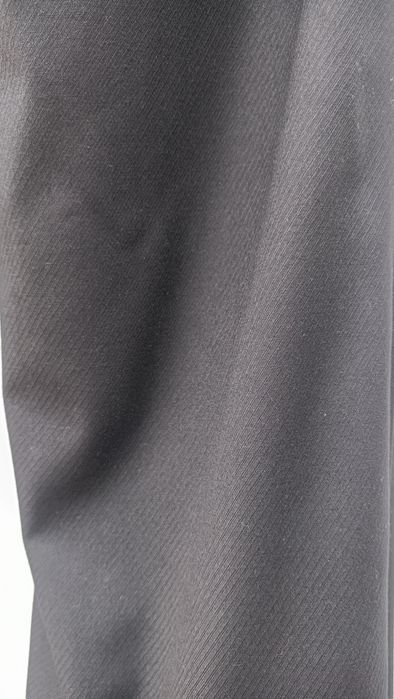 Calças pretas com botões dourados Zara