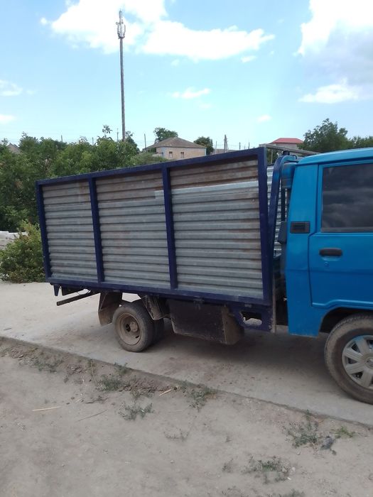 Вывоз мусора уборка территории гаражей доставка матеряла до2 тон или7