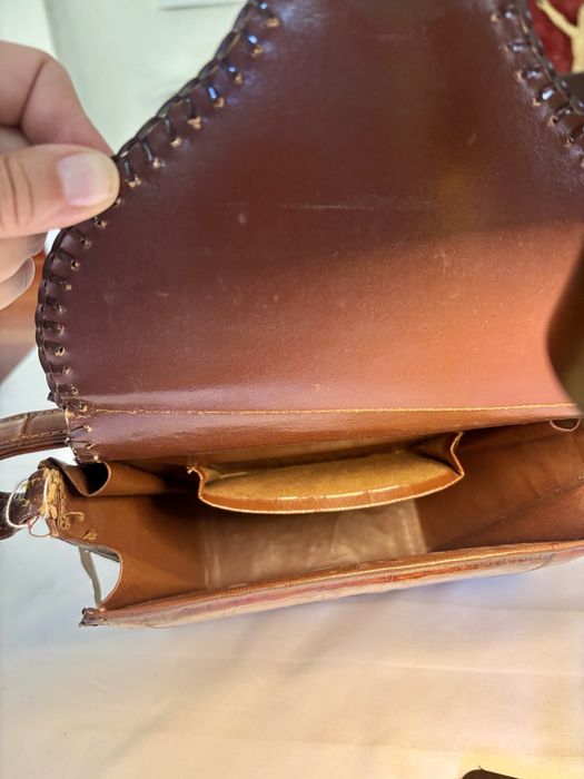 Mala em pele de crocodilo verdadeira