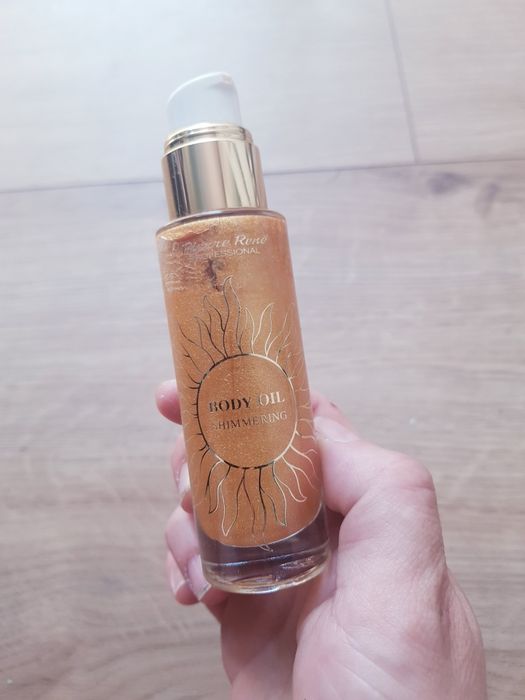 Rozświetlający olejek do ciała z drobinkami  marki Pierre René Professional 30ml