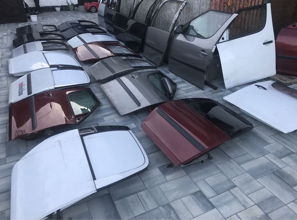 Двері ліві перед , дверь ліва задня skoda roomster 9102 срібло, замок