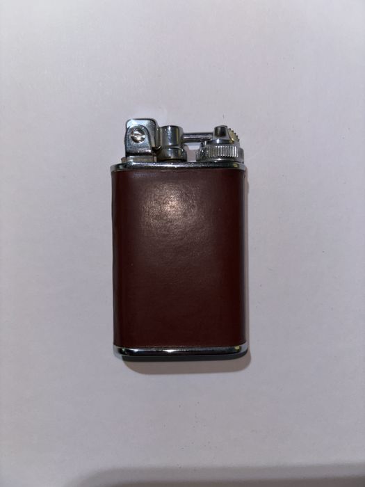 Antigo Isqueiro LANCEL revestido de couro Bordeaux, de 1950 a 1980