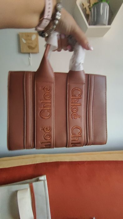 Mała nowa  torebka z napisem Chl