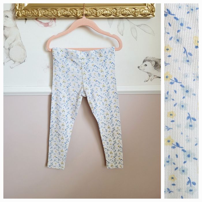 Spodnie 110 legginsy w prążek w kwiaty