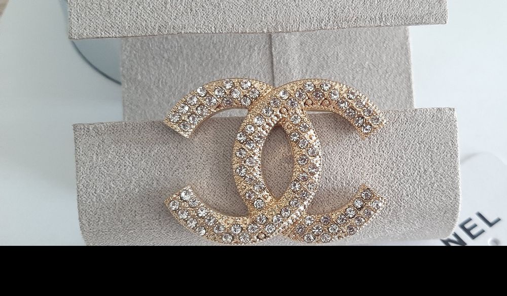 Przepiękna, złota broszka kryształki