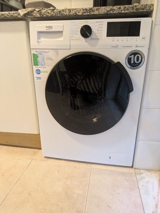 Máquina de lavar roupa e secar