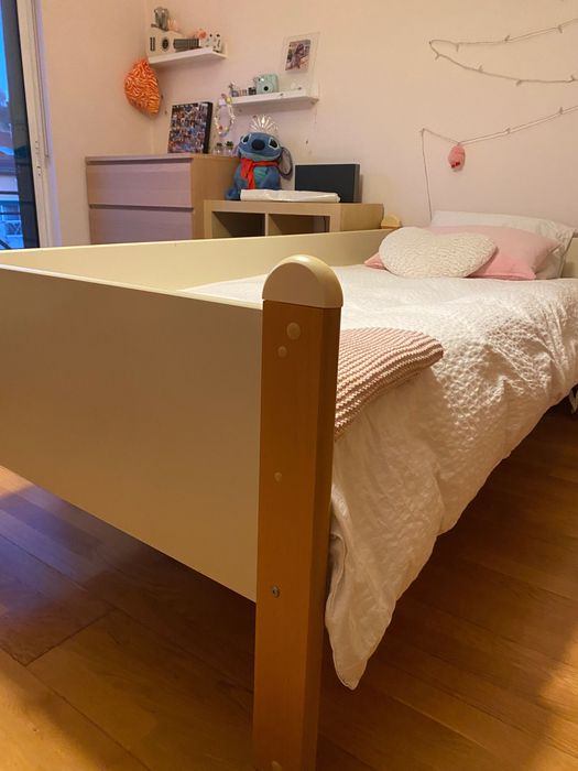 Cama individual com barra lateral