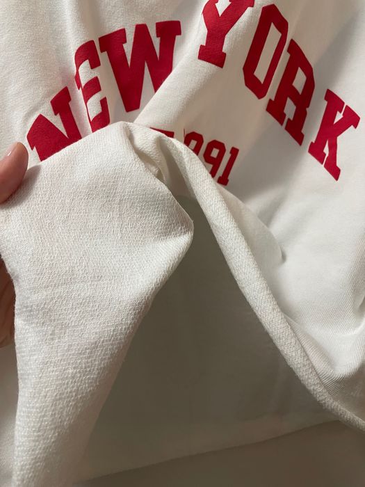 Luźna koszulka biała rozmiar M-XL do pępka