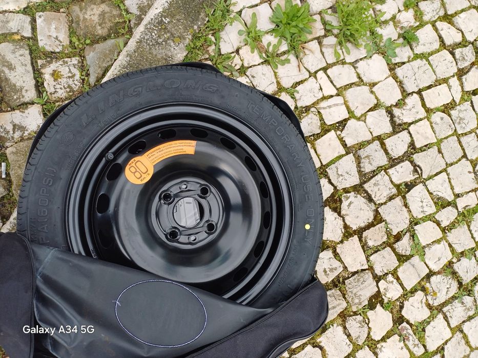 Kit Pneu suplente com macaco e chave de roda  nunca usado
