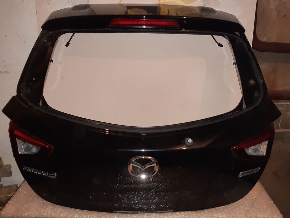 Кришка багажника оригінал Mazda 2 2014-2021