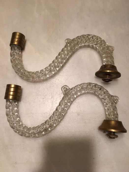 Hastes em vidro antigo