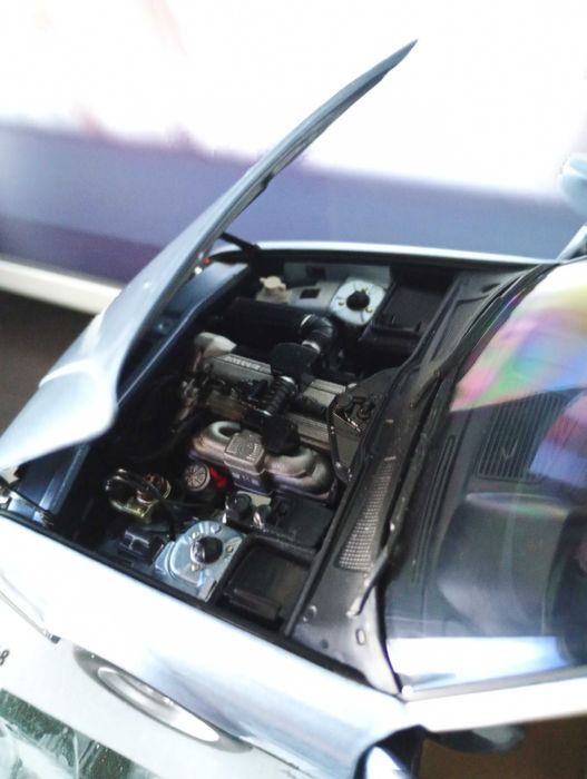 Model BMW E32 730i Minichamps 1:18 nowy w pudełku.