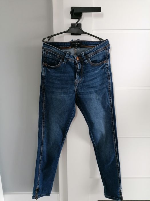 Jeansy skinny Reserved