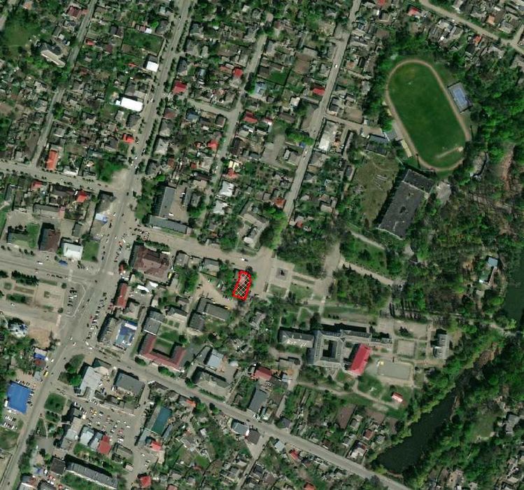 Продається земля і 1/2 будинку у м.Малин