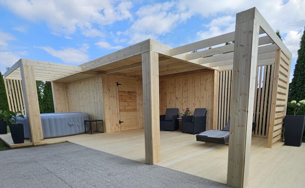 Domek ogrodowy a altaną i pergolami