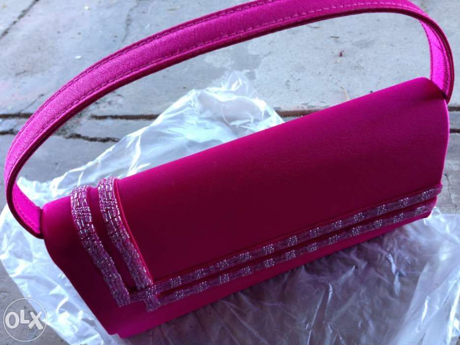 Vendo pochete de cor rosa