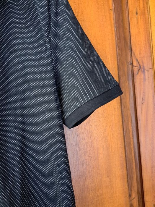 Polo homem botões