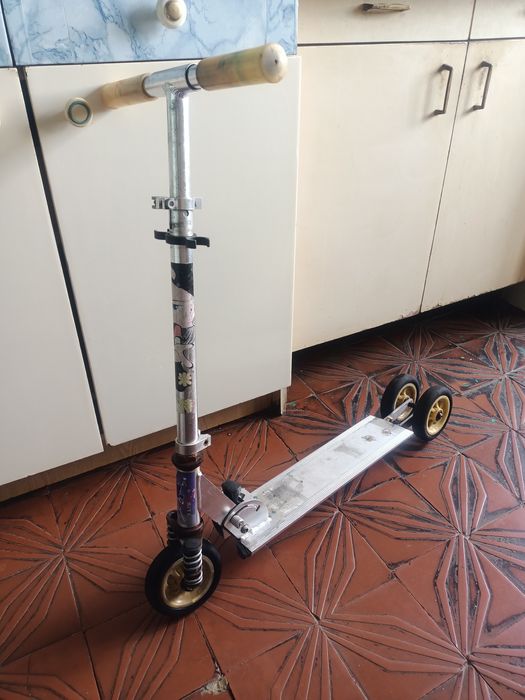 Детский складной самокат.