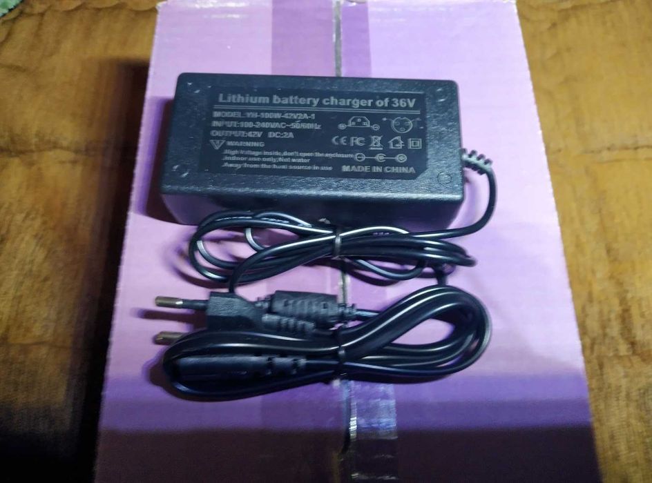 Зарядка до електровелосипеда самоката