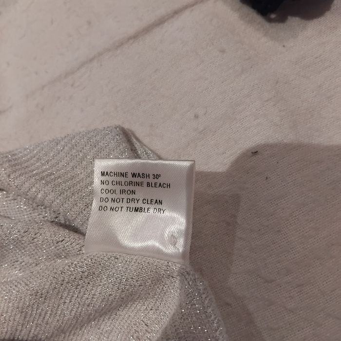 Sweterek biały ze srebrną nitką S/M