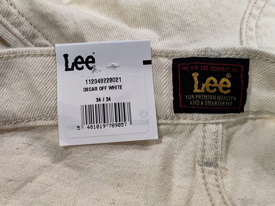 Spodnie jeansy Lee Oscar white dżinsy męskie luźne białe lato 34/34