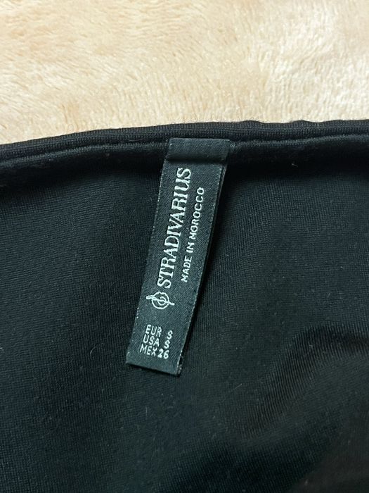 Elegancki top z kokardą