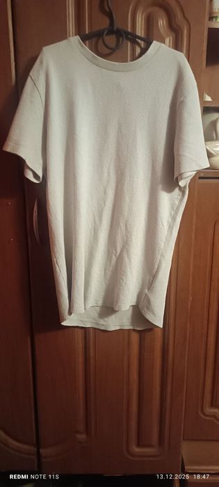 Футболка від бренду MAN