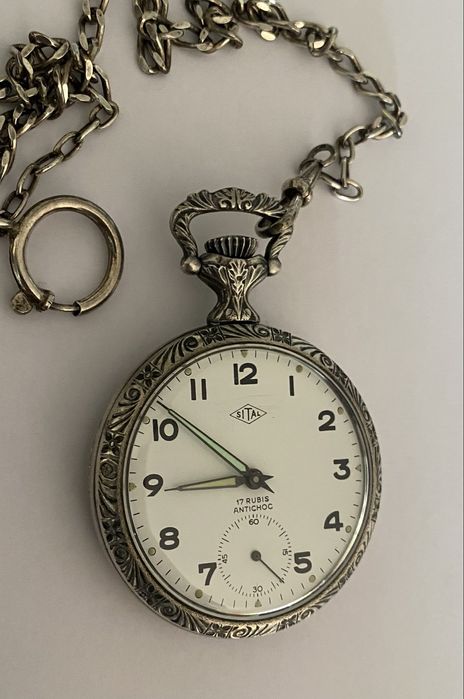 Relógio de bolso Sital, mecânico, com corrente.