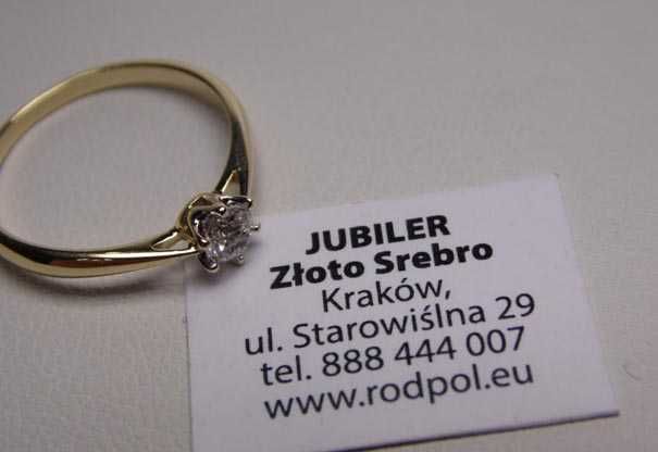 Apart złoty pierścionek z diamentem brylant 0,21 ct.
