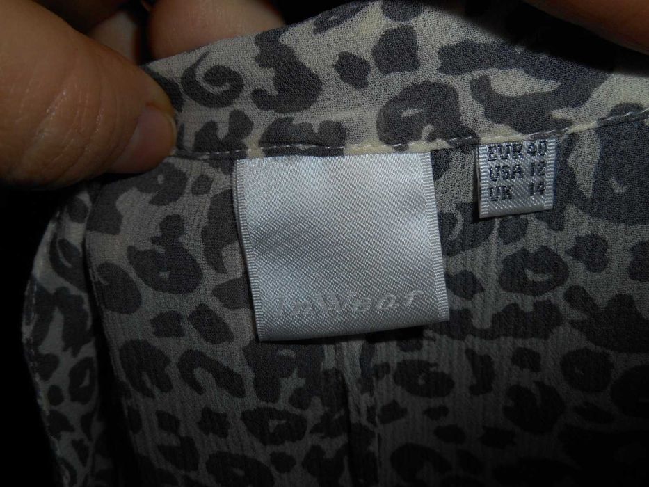 блузка цікавого кроя 48 размер