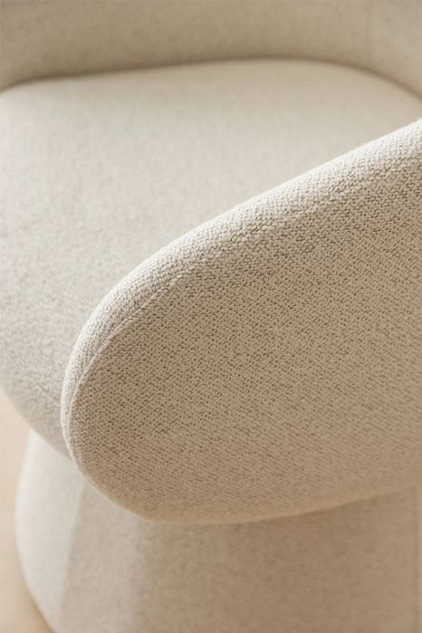 Poltrona giratória estofada Flavian