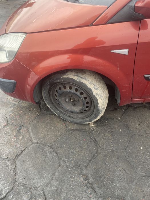 Blotnik lewy przód Renault SCENIC II, Teb76