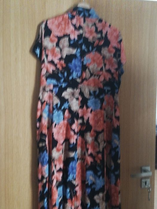 Vestido comprido com bolsos