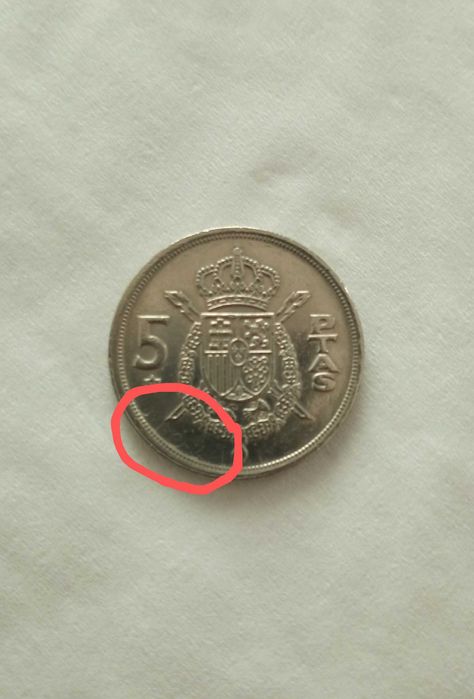 Moeda 5 pesetas com defeito