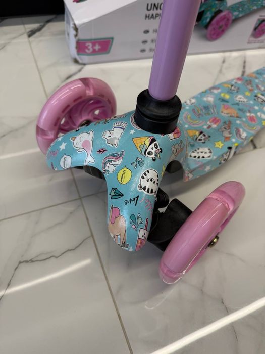 Самокат триколісний Kidwell Uno Happy для дівчинки рожевий бірюзовий