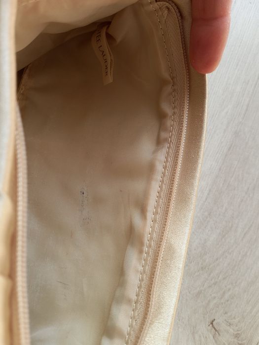 Torebka złota kopertówka Estee Lauder