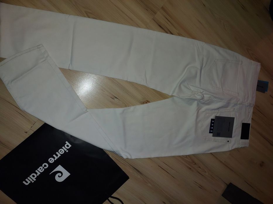 Nowe spodnie jeansowe dla wysokiej osoby rozm.34/38