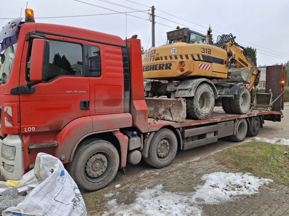 Transport laweta maszyny budowlane wozki widłowe koparki ładowarki