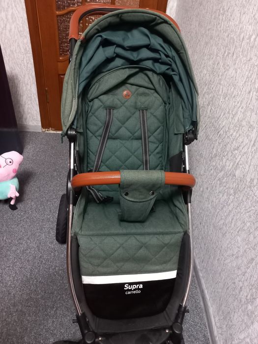 Продам прогулянковий візок, коляску  Carello Supra, надувні колеса.