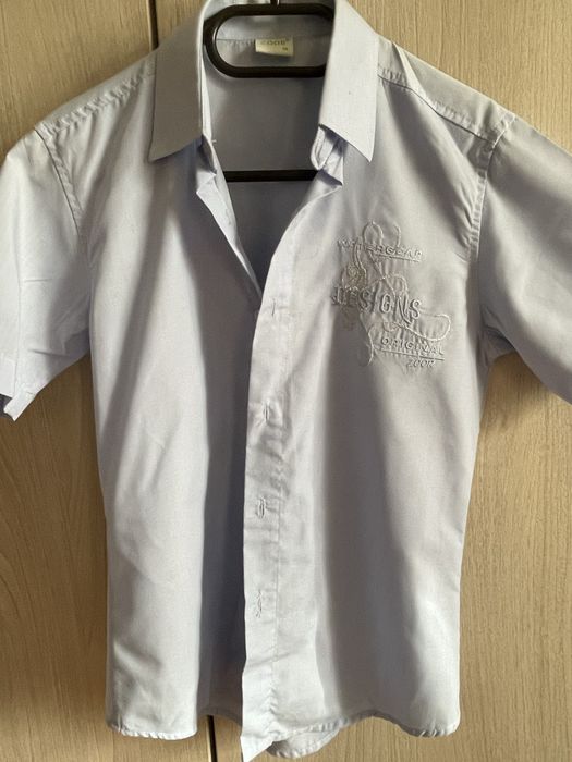 Сорочка блакитна, короткий рукав, вишивка -принт, зріст 140