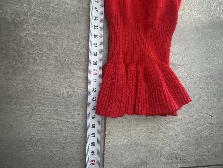 Sweter czerwony z falbanka