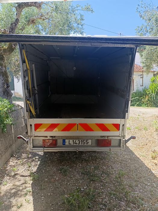 Reboque humbaur de lona com porta