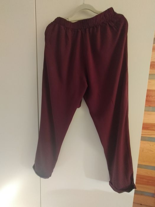 Letnie spodnie na gumce marki Carry rozmiar XS stan bardzo dobry.