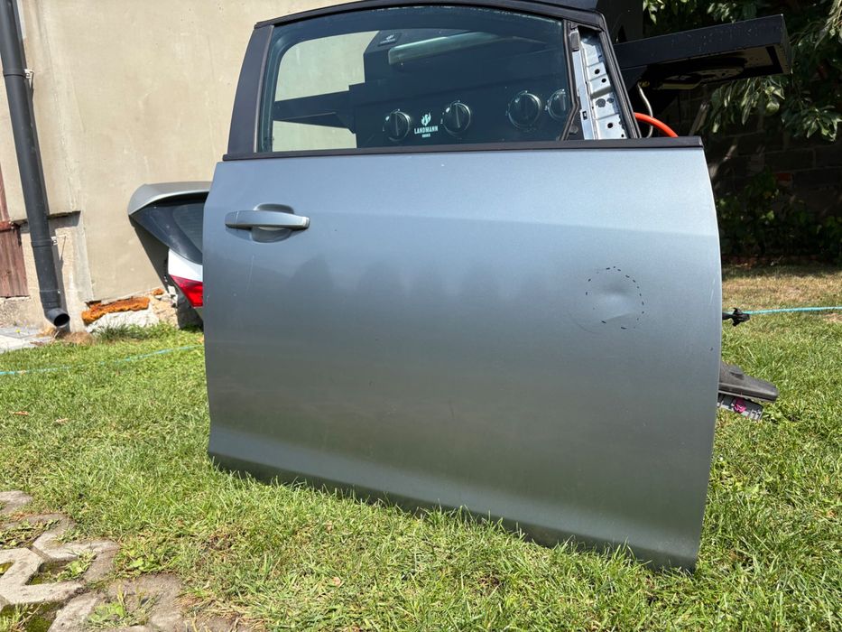 Drzwi Przód Prawe Opel Astra J Srebrne / Szare (Szyba, Klamka, Głośnik)