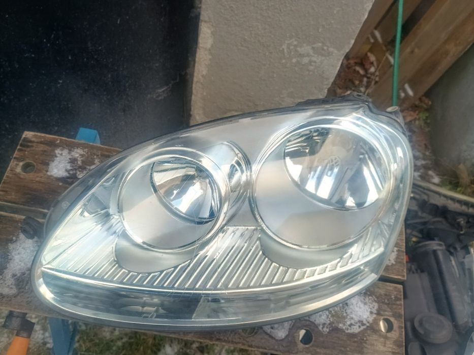 VW Volkswagen Golf V 5 lampa przednia lewa AL