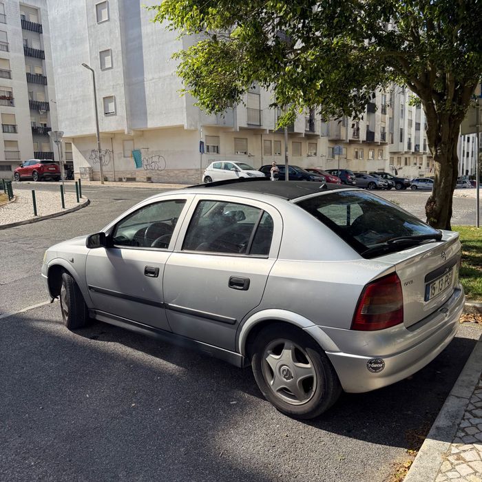 Astra 2000 1.4  gasolina com teto de abrir
