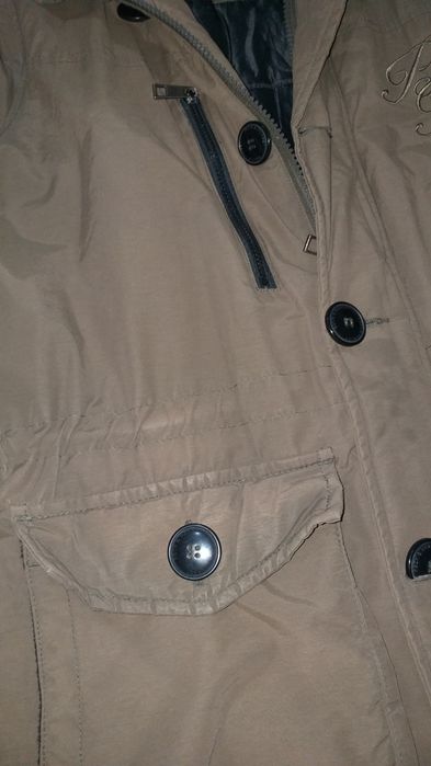 Зимняя теплая фирменная куртка б.у.