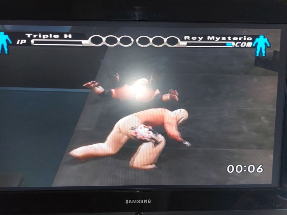 Jogo PS2 ( PlayStation 2 ) Smackdown VS RAW 2004 (Opt. Estado)