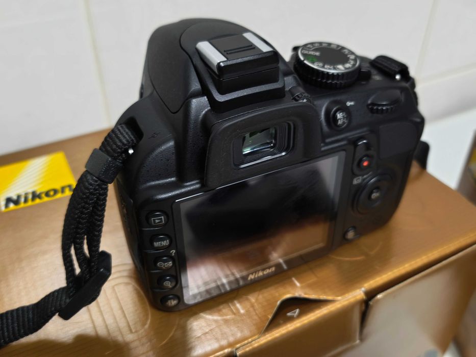 Nikon D3100 Pack com duas objetivas e acessórios. Como novo.