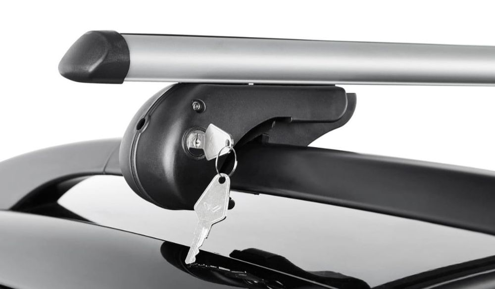 Barras de tejadilho novas na caixa